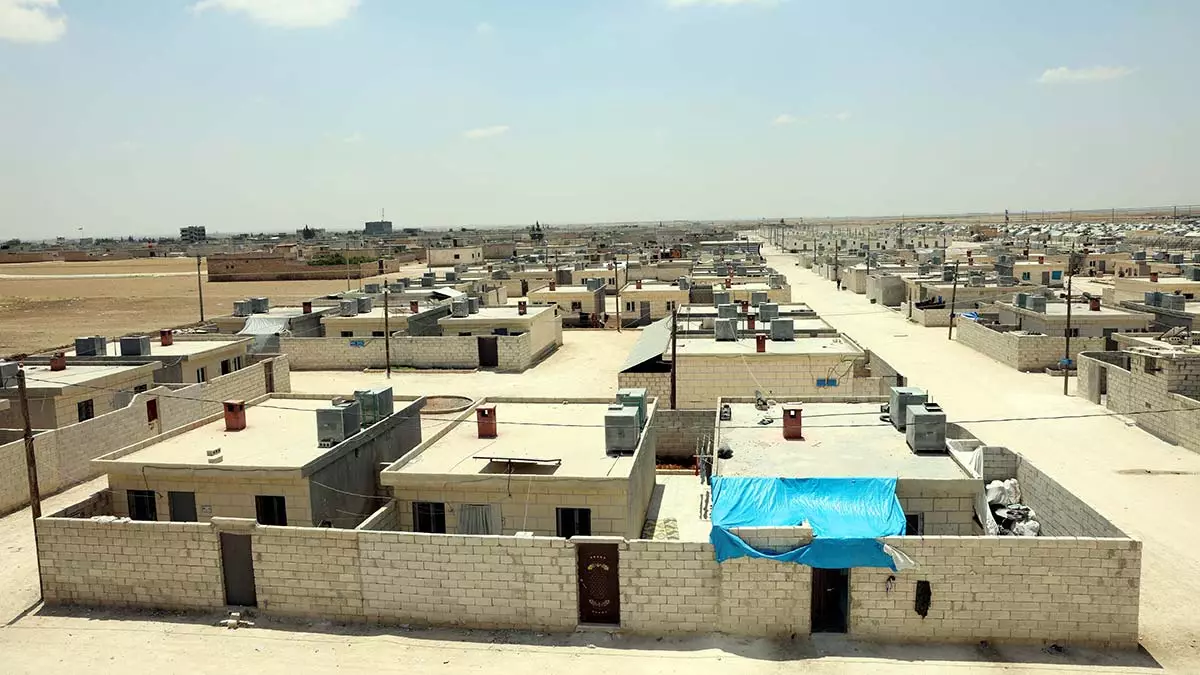 Suriyelilerin briket evlere yerlesme mutlulugu 2 - haberler - haberton