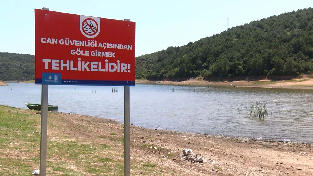 Tehlike uyarısına rağmen göle girdiler