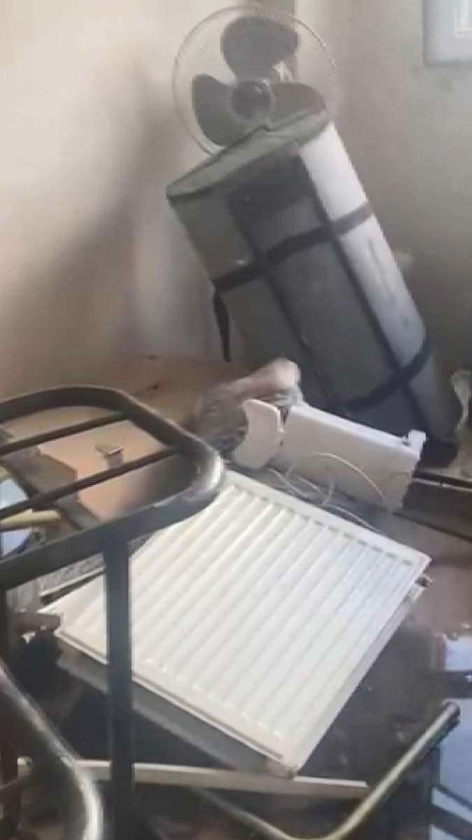 Malzeme çalarken bina sahiplerine yakalandı