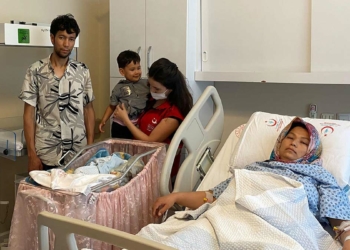 Afganistan uyruklu Züheyla nehir kıyısında doğum yaptı