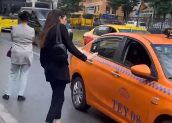 Yolcunun taksiciye küfredip yumruk atmaya çalıştığı iddiası
