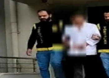 Çaldığı doktor önlüğüyle hastaneye girerken yakalandı