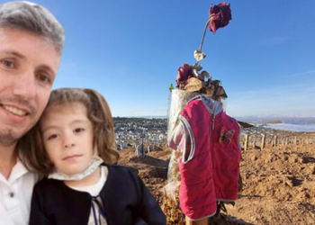 Mezarlıktaki kırmızı montun altından dram çıktı
