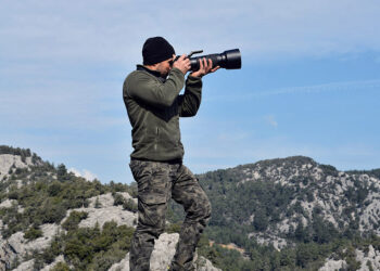 İnşaat işçisi doğa fotoğrafçısı