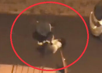 Kadını sokak ortasında saçından tutarak sürükledi