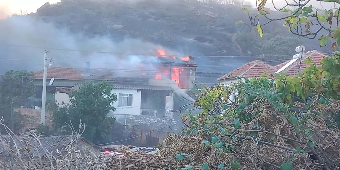 Manisa'daki orman yangını 14,5 saatte kontrol altına alındı; 2 ev, 1 depo ve 300 hektar alan zarar gördü, 2 mahalle tahliye edildi.