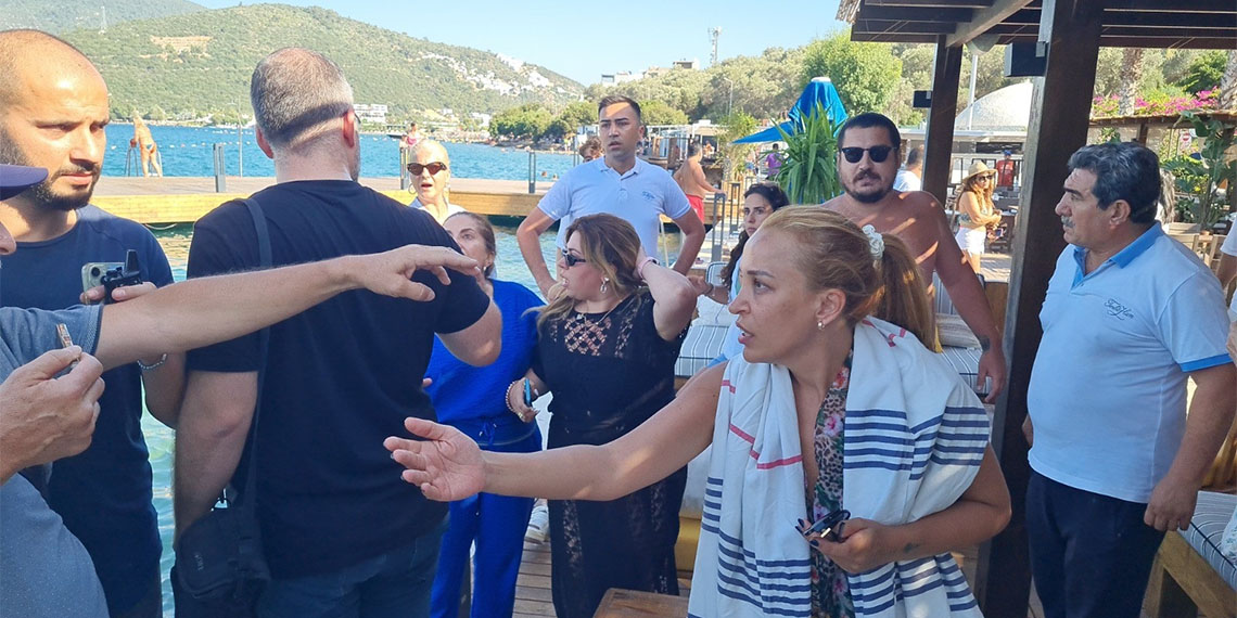 Bodrum'da kıyı işgallerine karşı yapılan eylemde, bölgeden geçen eylemcilere bir otelin yetkililerinin müdahalesi sonrası arbede yaşandı.