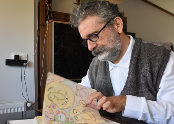 Karikatürleriyle yaşama bağlandı