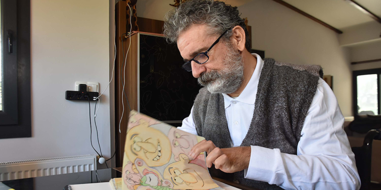 Karikatürleriyle yaşama bağlandı