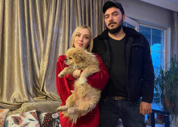 Ayaklarını bağladığı köpeği çöp konteynerine attı