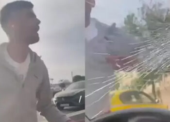 Uygulama üzerinden çağırılan aracın önünü kesip camını kırdı