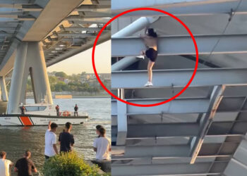 Haliç Metro Köprüsü'nün altındaki demirlerden sarkan kadın ikna edildi