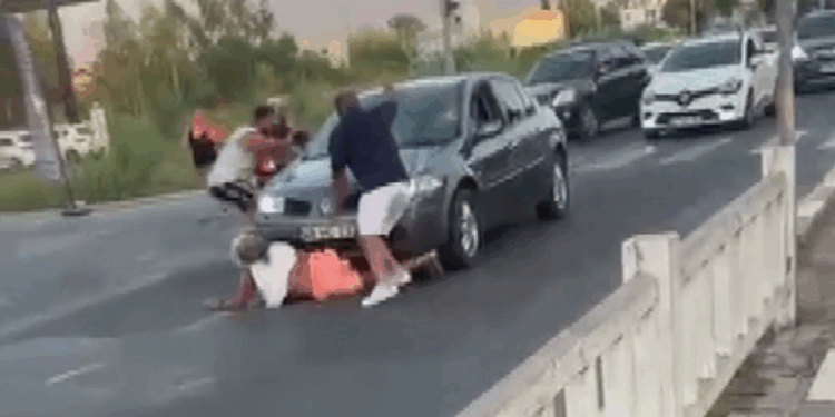 Otomobiliyle, çarptığı kadının üzerinden geçip kaçmaya çalıştı