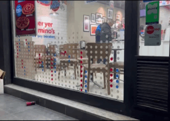 Bursa'da pizza dükkanına silahlı saldırı