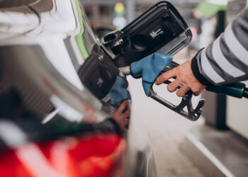 Car refueling at fuel station