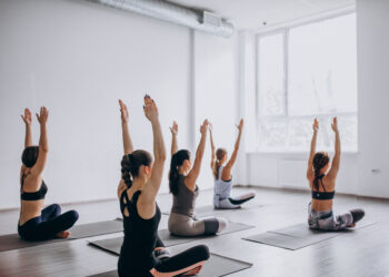 Yoga group classes inside the gym