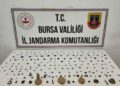 Bursa'da aranan araçta 202 sikke ve obje ele geçirildi; 2 gözaltı