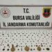 Bursa'da aranan araçta 202 sikke ve obje ele geçirildi; 2 gözaltı